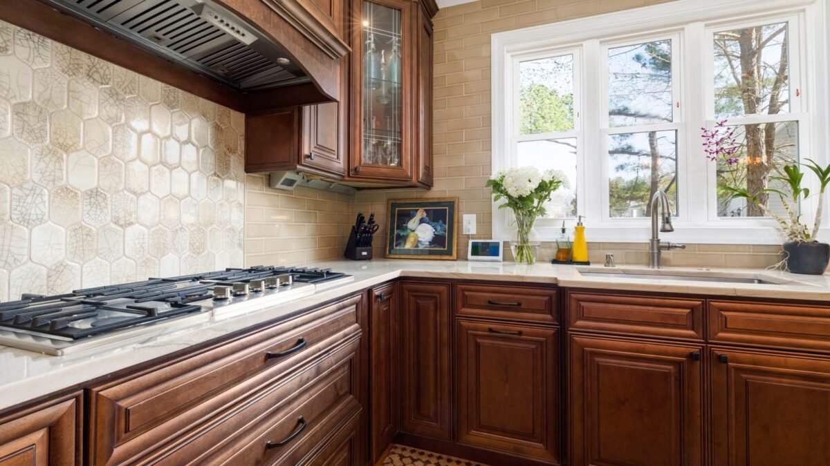 Elegant kitchen featuring classic wooden cabinetry and modern appliances, perfect for contempor, illustrating best reverse osmosis system for well water